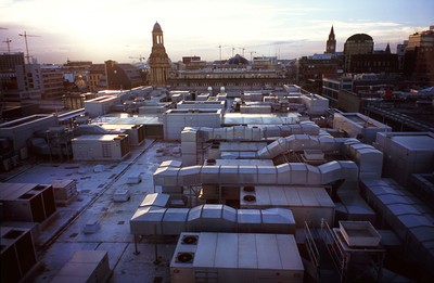 Rooftop industrial airconditioning ducts and equipment on a commercial building